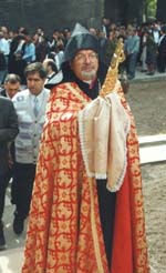 The relic of St. George in the hands of Archbishop Mesrob Ashjian