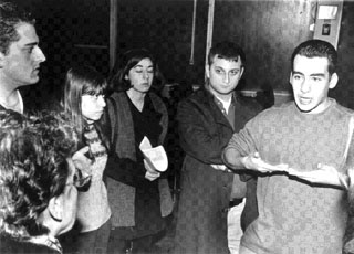 After the lecture, Masis Koumrigian argues with a Genocide denier, as Armen Sevag (l.), Varteni Koumrigian, Araz Koumrigian, and Sevag Shirozian look on. Photo by Tina Tcholakian