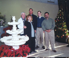 Opening Day at P.S. Flower Mart with 1. to r., Bill Casey, CEO David Aaker, and Dave Linden of the Palm Springs Chamber of Commerce, and owners Mary Mkrtchian and V.J. (far right).