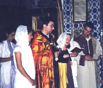 Participants of the Youth Pilgrimage stand in front of the Armenian Lord's Prayer (Hayr Mer) at Pater Noster.